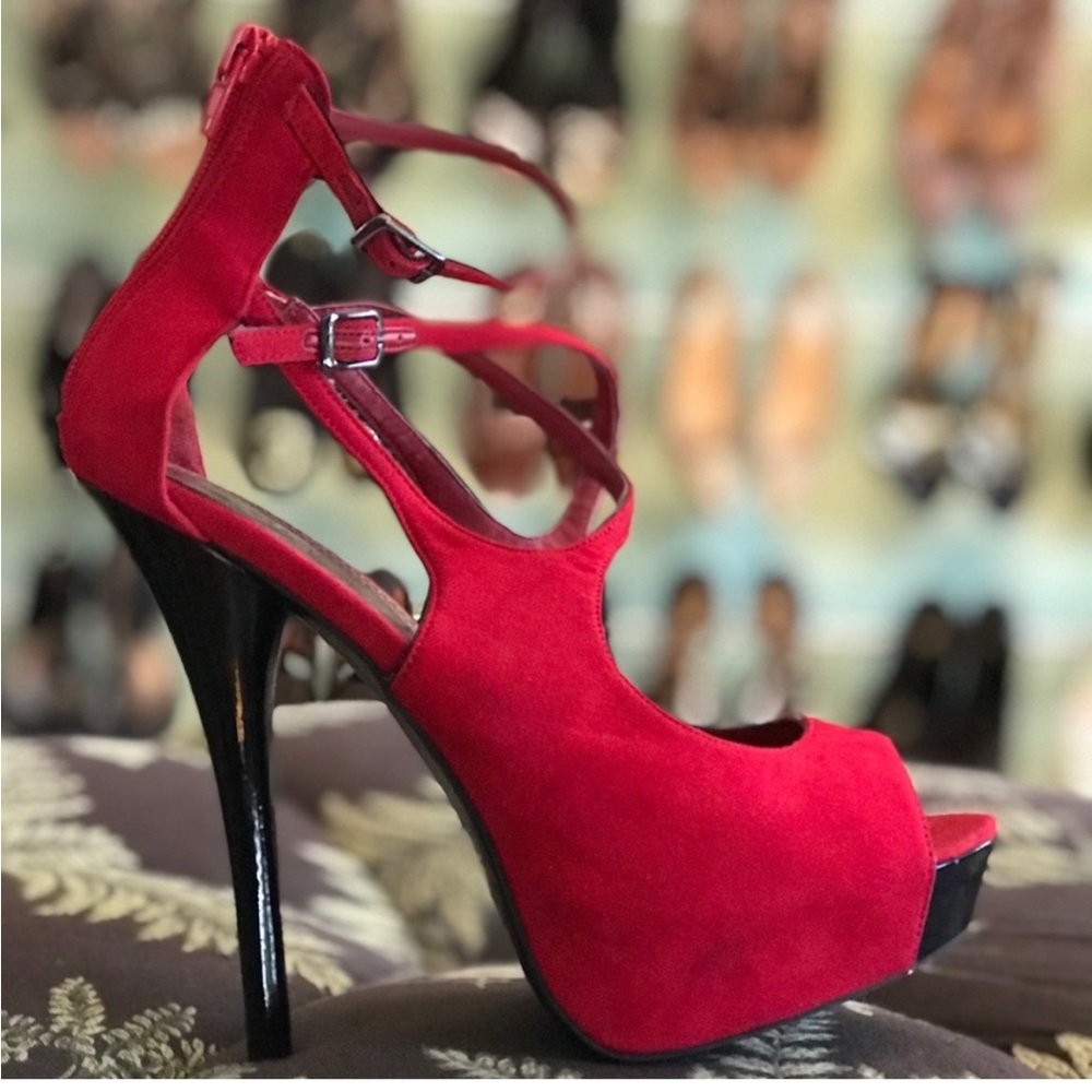 Red platform heels by Bakers are in like new condition. Size 5